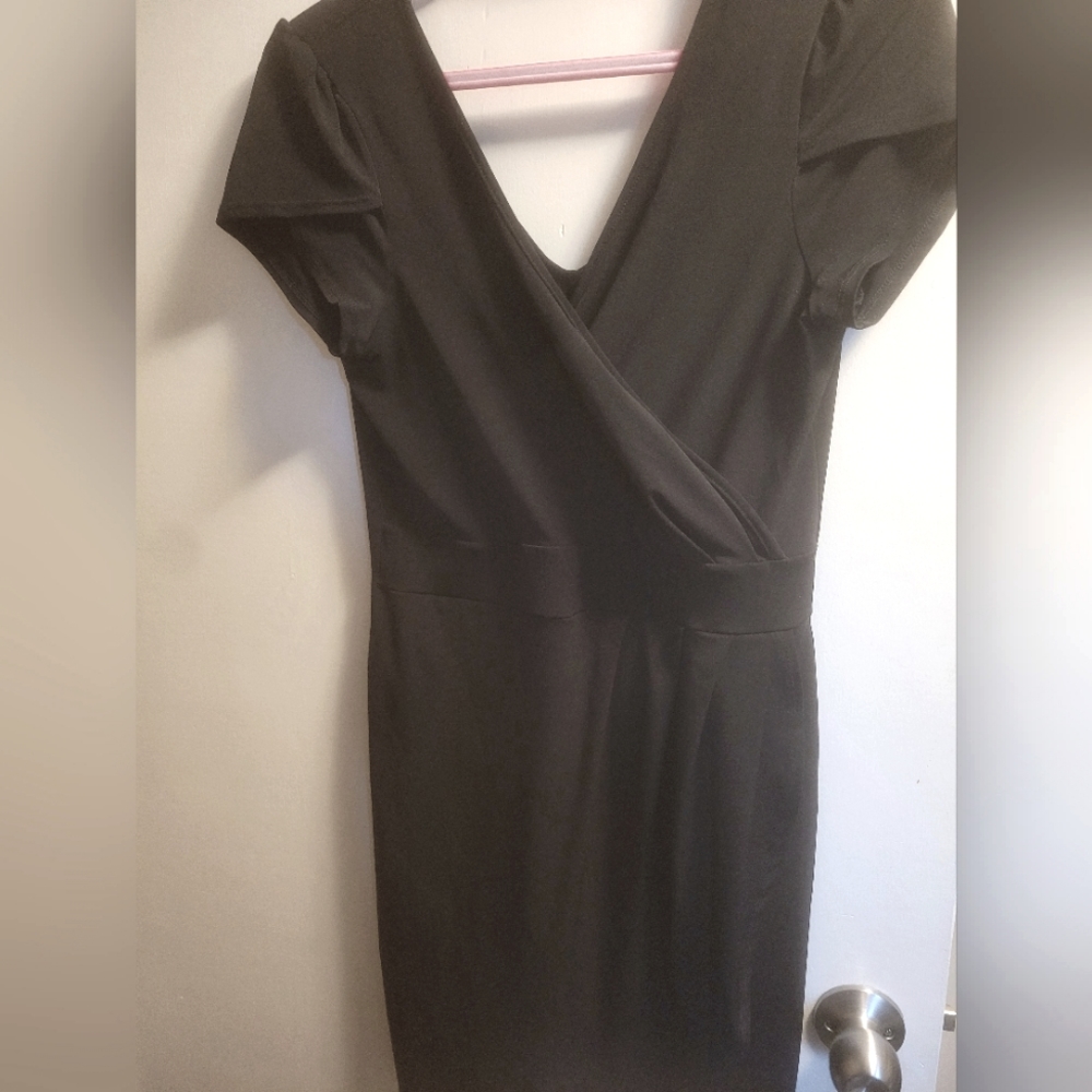 2/$20 Incredible little black dress.